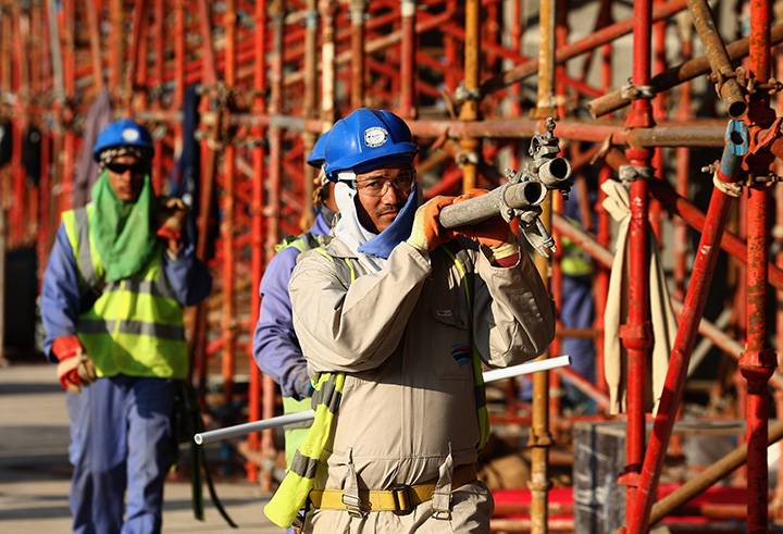 C:\Users\Morteza\Desktop\جام جهانی و وضعیت کارگران\Construction workers on Khalifa International Stadium ahead of the 2022 FIFA World Cup Qatar on December 30, 2015 in Doha,.jpg